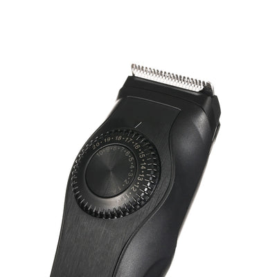 Black adjustable electric hair clipper with two guide combs, USB cable, oil, and cleaning brush, shown with its retail box. - Image 4