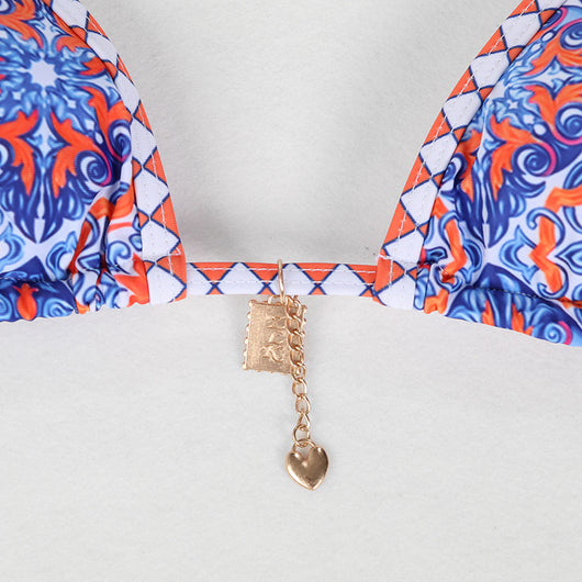 Retro 4-color printed women's bikini with red, blue, and white paisley pattern, featuring a triangle top and high-cut bottom. - Image 16
