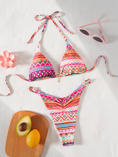 Vibrant geometric print triangle-bra bikini swimsuit with adjustable ties and high-cut ruched bottom. - Image 6