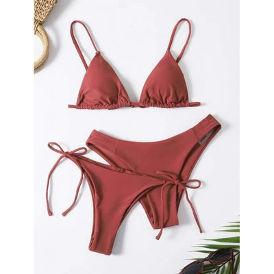 Lavender three-piece bikini set with a triangle top, tie-side bottom, and high-cut bottom, displayed with a straw hat and purple sunglasses. - Image 3