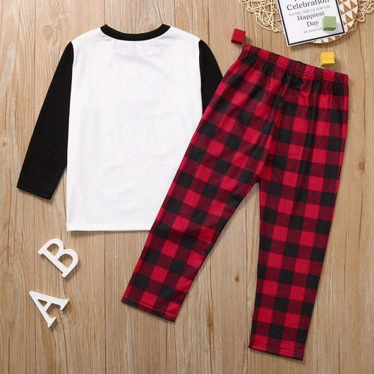 Family matching Christmas pajamas with red and black buffalo plaid pants and white long-sleeve tops featuring a deer graphic and "MERRY CHRISTMAS" text. Include - Image 9