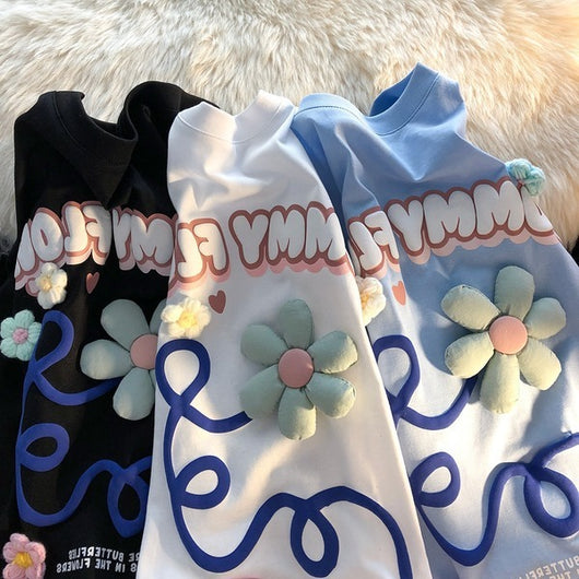 Playera Estampada con Letras Florales y Espuma - Image 10