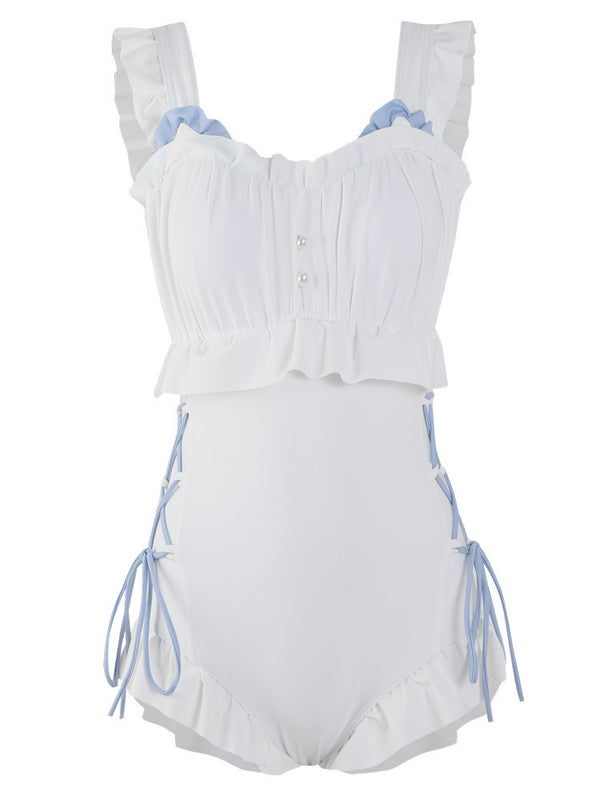 Women's white one-piece swimsuit with light blue lace-up sides, ruffled straps, and pearl-like buttons. - Image 6