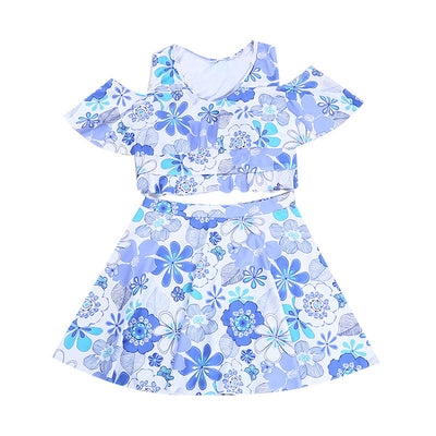 Two women in matching blue and white floral print swimsuits with off-shoulder ruffled tops and A-line skirts by the ocean. - Image 10