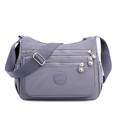 Bolsa Mensajera Unisex Nylon Ligera - Diseño Minimalista y Funcional - Image 9