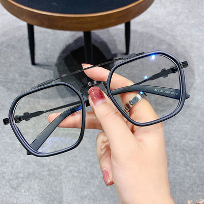 Black and gold double beam retro square frame anti-blue light glasses held by a hand. - Image 11
