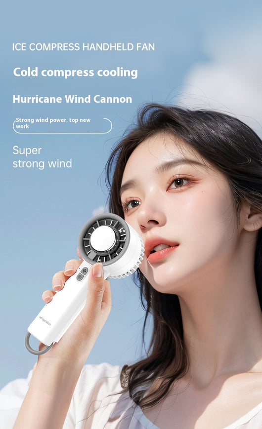 Obsidian black handheld fan with gold accents, digital display, and semiconductor ice cooling for high-speed cool air. - Image 22