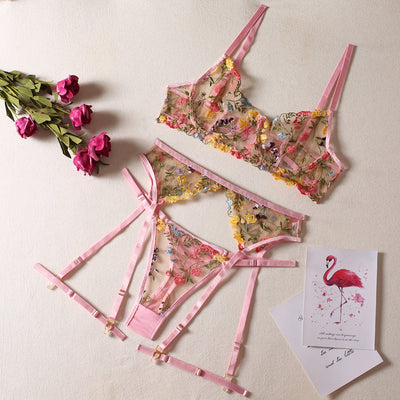 Yellow sheer floral embroidered lingerie set with a bra, thong, and two leg rings, laid flat. - Image 13