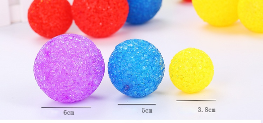 Assortment of colorful textured plastic cat toy balls in red, yellow, blue, purple, pink, and green. - Image 13