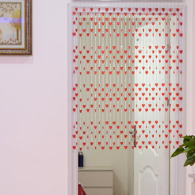 Close-up of a decorative door curtain with alternating red heart-shaped beads and clear faceted acrylic beads. - Image 10
