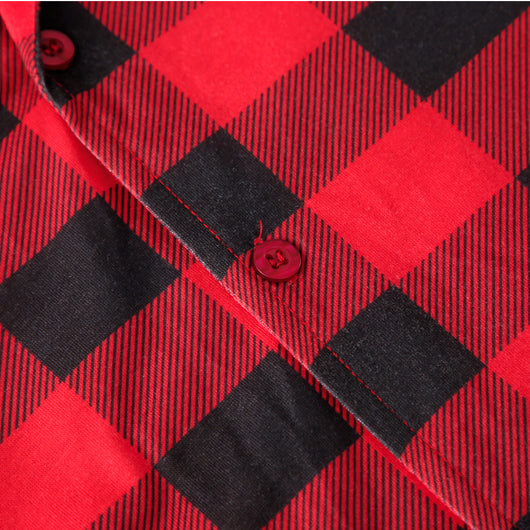 Baby in a red and black buffalo plaid long-sleeve pajama romper, viewed from the back with arms raised. - Image 17