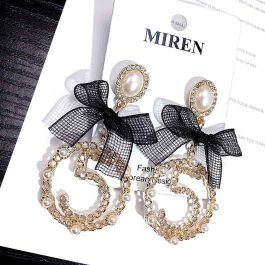 Aretes Circulares Dorados con Perla y Moño - Diseño Elegante y Trendy - Image 6