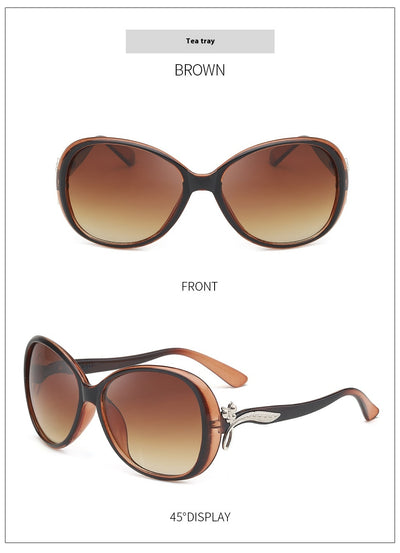 Brown oversized butterfly sunglasses with gradient lenses and a silver-tone floral accent on the temple. - Image 19