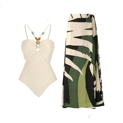 Women's olive green ribbed one-piece swimsuit with colorful beaded straps and matching abstract print sarong skirt. - Image 17