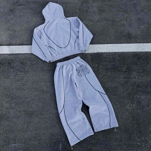 Light gray hooded tracksuit with dark gray contrast stitching, featuring a full-zip hoodie and matching loose sweatpants. - Image 14