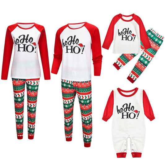 White and red Christmas pajama set with "Ho Ho HO!" text and fair isle patterned pants.