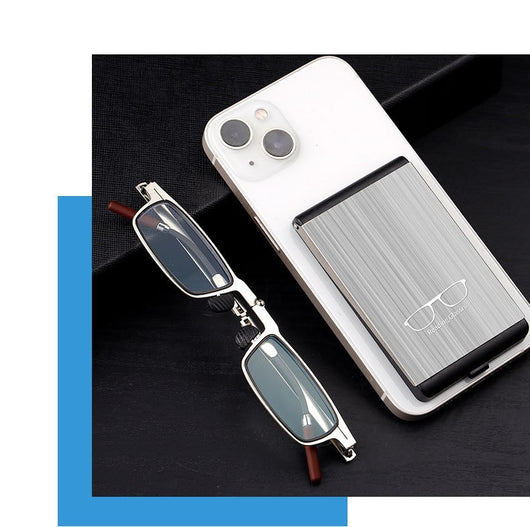 Foldable blue light blocking glasses with silver frames in a black case, shown on a smartphone. - Image 7