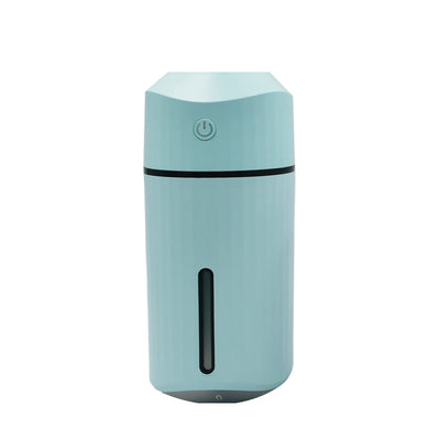 Pink columnar mini car humidifier with a power button and a clear water level indicator on a white background. - Image 9