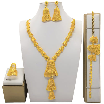 24k gold-plated jewelry set with bell-shaped, textured necklace, bracelet, dangle earrings, and ring on white displays.