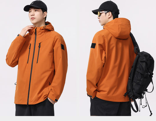 Man wearing a black windproof and waterproof outdoor jacket with a hood, sports sunglasses, and a bucket hat, holding a trekking pole. - Image 13