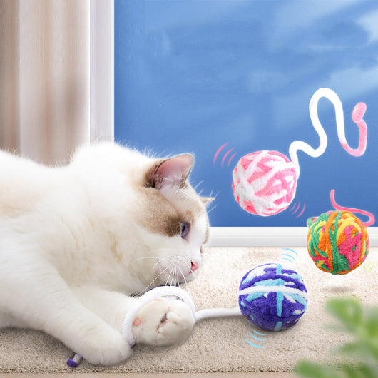 Colorful plush wool ball cat toys with long yarn tails, featuring various patterns and a bell inside for play. - Image 5