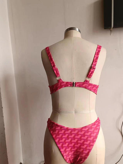 Women's pink and red geometric print bikini with underwire top and high-cut bottoms, styled with a white shirt. - Image 13