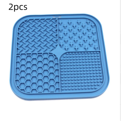 Gray silicone pet licking pad with four textured sections, designed for slow feeding and anti-choking. - Image 13