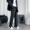Pantalones Rectos con Aberturas Laterales y Efecto Acampanado