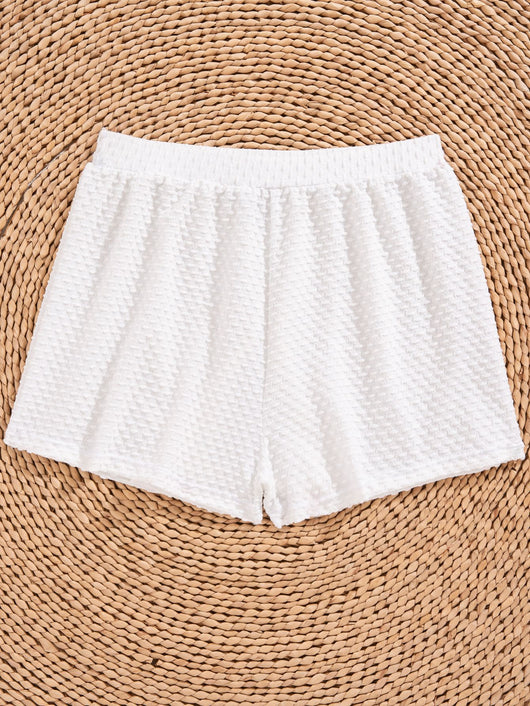 White polka dot three-piece swimsuit for women, featuring a halter bikini top with ruffled trim and matching high-waisted shorts. - Image 11