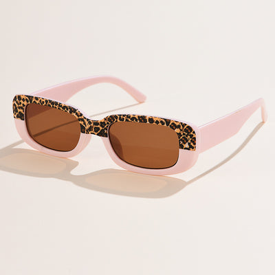 Rectangular tortoiseshell sunglasses with a small frame and dark gray lenses, angled on a white background. - Image 5