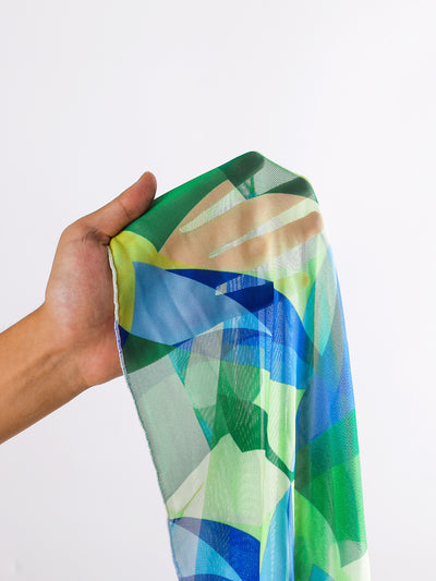 Sexy lace-up backless beach swimwear skirt set with a vibrant blue, green, and yellow geometric print. - Image 8