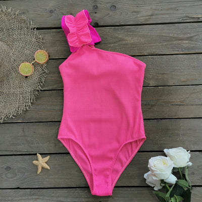 Black one-shoulder ribbed one-piece swimsuit with a ruffled blue and black strap, ideal for women's swimwear. - Image 29