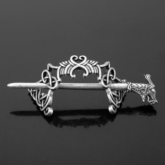 Silver metal hair clip with a retro dragon head and infinity knot design, secured by a plug-in hairpin. - Image 5