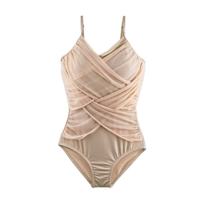 Women's beige one-piece swimsuit with ruched tummy-hiding detail and spaghetti straps on a beach. - Image 8
