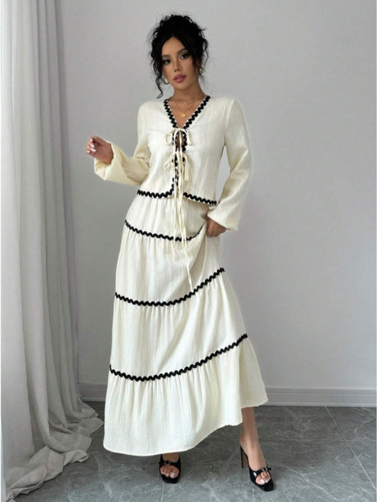 Conjunto Elegante con Blusa de Encaje y Falda Plisada con Mangas Farol - Image 13