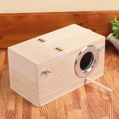 Light-colored wooden birdhouse with a circular silver metal entrance, a wooden perch, and brass-colored hardware. - Image 12