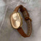 AM 28 Marrom Com Dourado