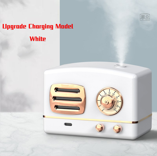 White retro humidifier with rose gold accents, designed like a vintage radio, emitting a fine mist. - Image 9