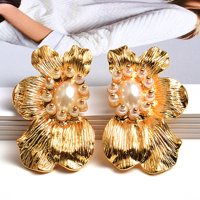Aretes de Flores Exageradas con Metal Simétrico - Estilo Europeo y Americano - Image 6