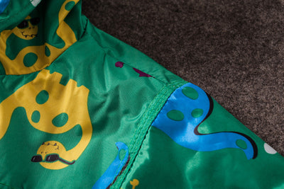 Chaqueta Impermeable para Niño con Capucha - Diseño Dinosaurio Resistente al Viento - Image 3