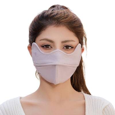 Woman wearing a grey outdoor cycling wind mask with ear hooks and a small heart logo, designed for cold-proof eye protection. - Image 5