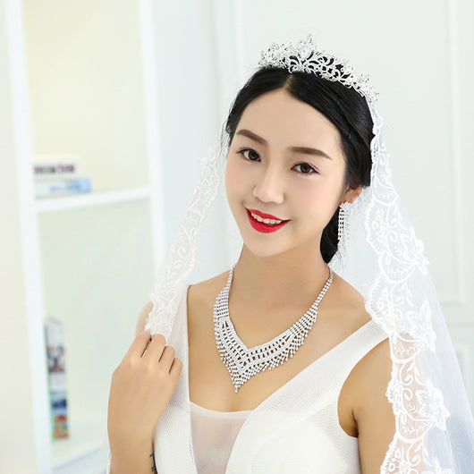 Sparkling rhinestone necklace and dangle earrings set. Large V-shaped bib necklace with claw chain design and matching long drop earrings. - Image 9