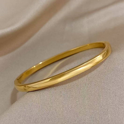 Pulsera Oval Curva Brillante en Acabado Sólido - Image 8