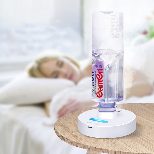 White round portable USB humidifier with a night light, single fog outlet, and two control buttons. - Image 4