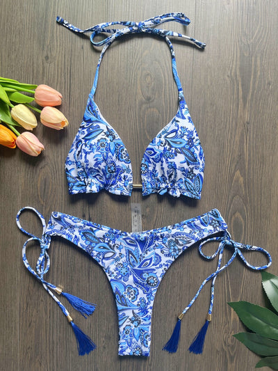 Women's blue and white porcelain print halter bikini with tie-side bottoms and blue tassels. - Image 15