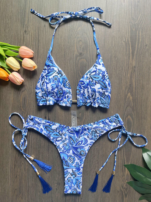 Women's blue and white porcelain print halter bikini with tie-side bottoms and blue tassels. - Image 15