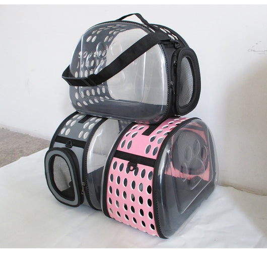Gray and black pet carrier with a clear bubble window featuring paw prints and a mesh side for ventilation. - Image 31