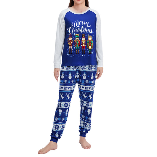 Blue and white long-sleeve Christmas pajama set with "Merry Christmas" text, nutcracker soldiers, and snowflake patterns. - Image 2