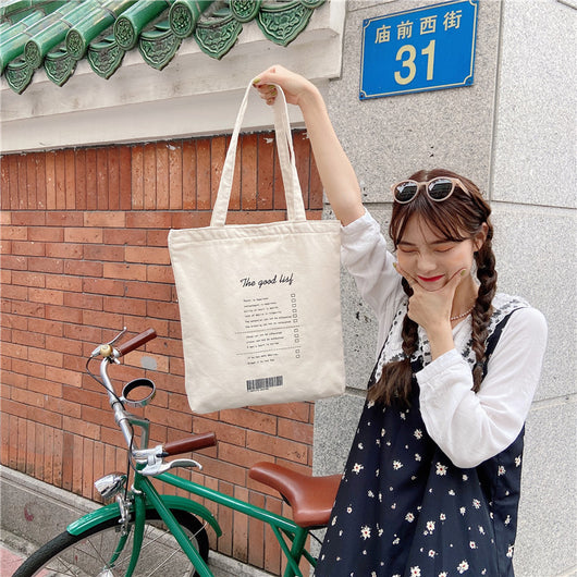 Bolsa de Lona Grande Estilo Coreano con Capacidad Extra para Compras y Viajes - Image 9