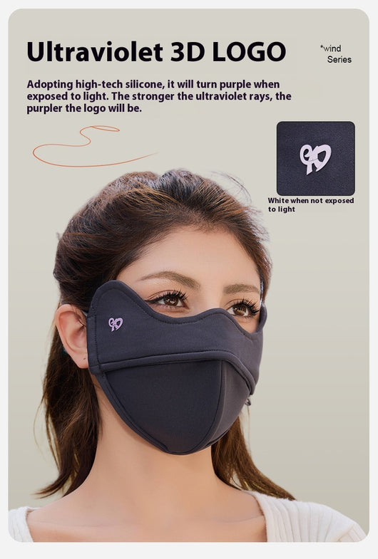 Woman wearing a grey outdoor cycling wind mask with ear hooks and a small heart logo, designed for cold-proof eye protection. - Image 11